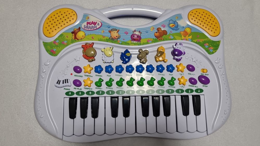 Jucarie orga pentru copii cu sunete, melodii, lumini si functie de inr