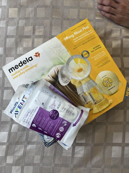 Молокоотсос Medela