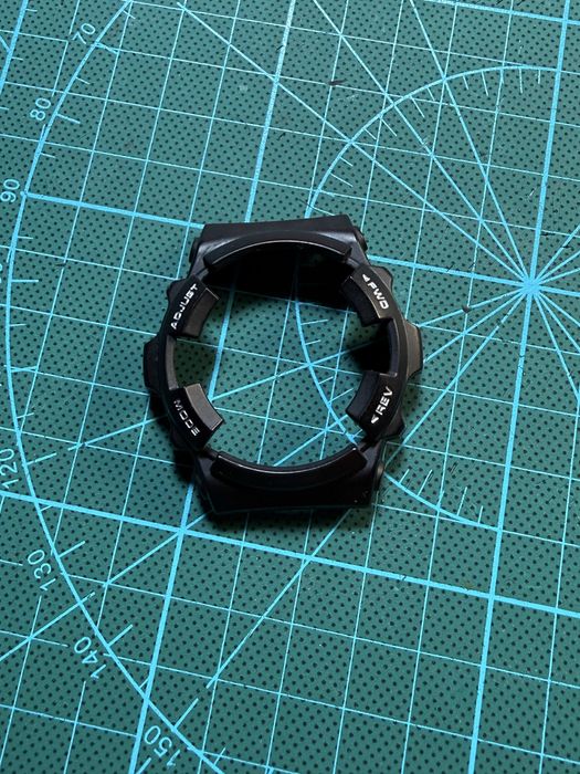 Bezel compatibil Casio MRG-1 – nou, inscriptie alb-argintiu