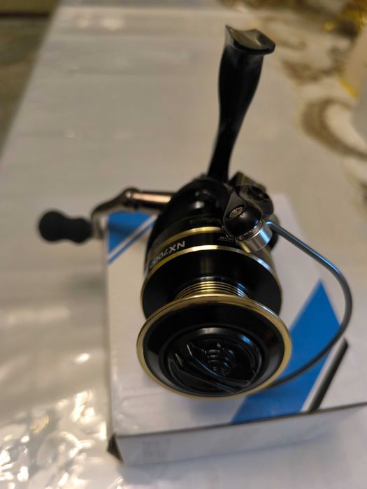 Продам новую катушку NX 7000.
