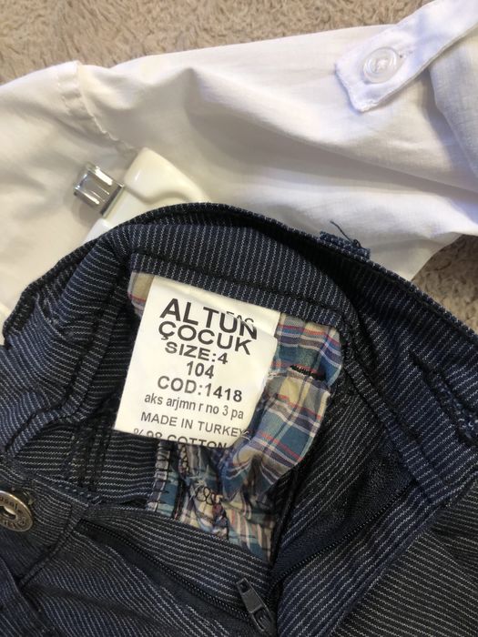 Продам рубашки,брюки и шорты