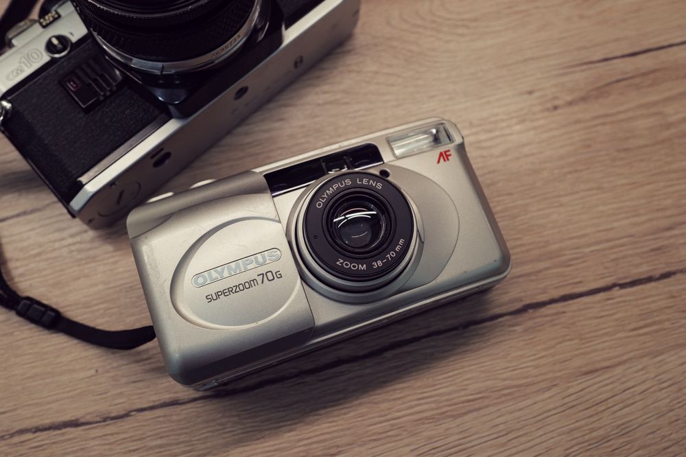 Lot aparate foto Olympus film OM10 obiectiv 50 1.8 si Superzoom 70 Mju