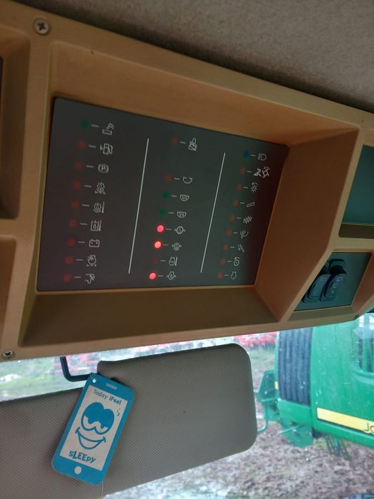 vând combina John Deere W540