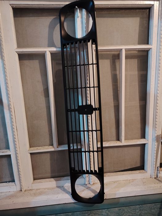 Передний ришотк а радиатор нива2121