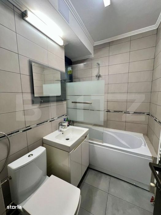 Apartament cu 2 camere, parter, centrala si AC, zona centrala
