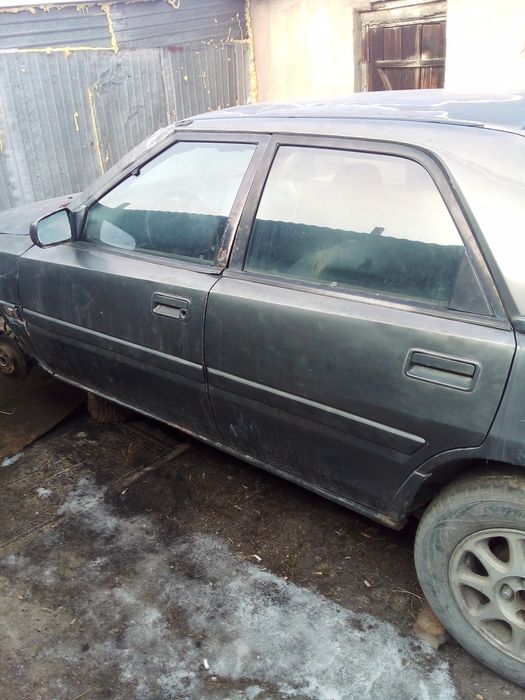 Продам машину мазда 323