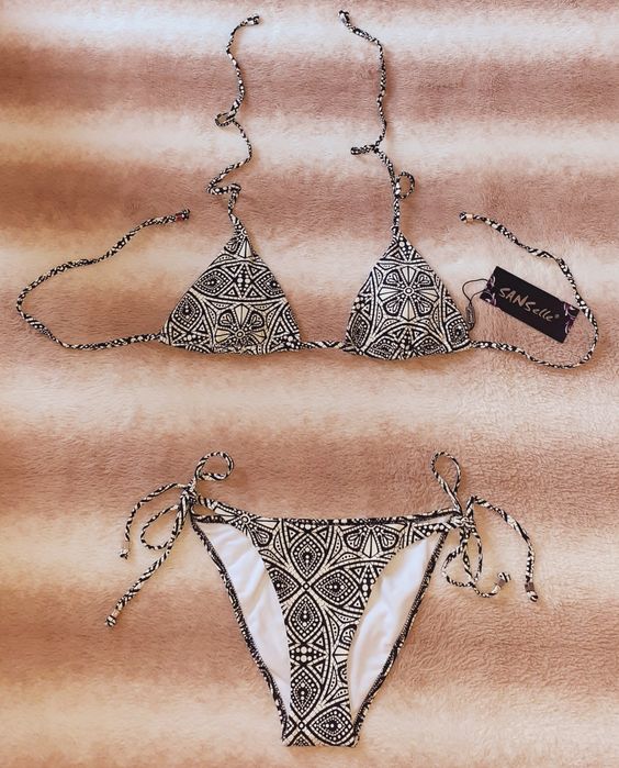 Продавам - Нов дамски бански - S/M размер - бледо жълт цвят с черно.