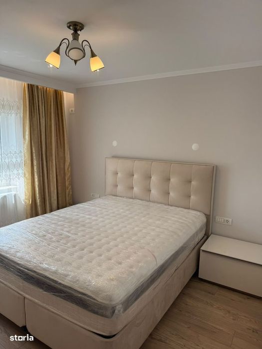 Inchiriere 3 camere, cu loc de parcare, totul nou