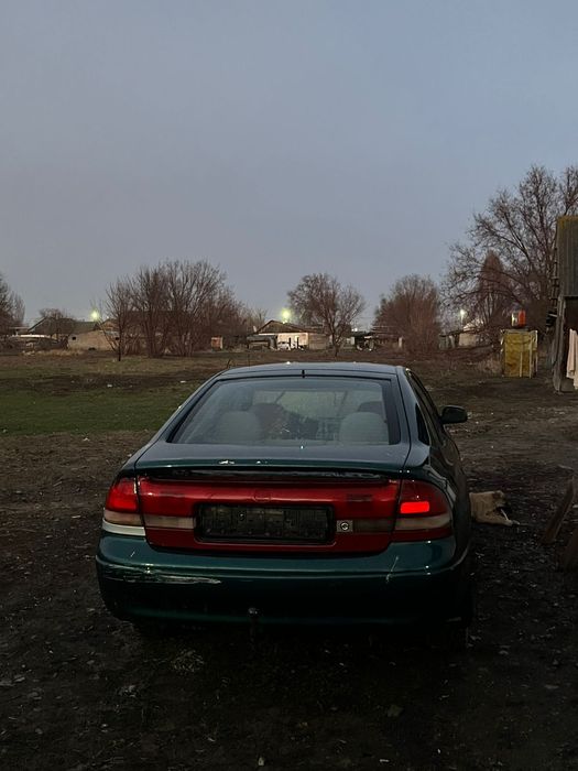 Мазда кронус жасыл түсті