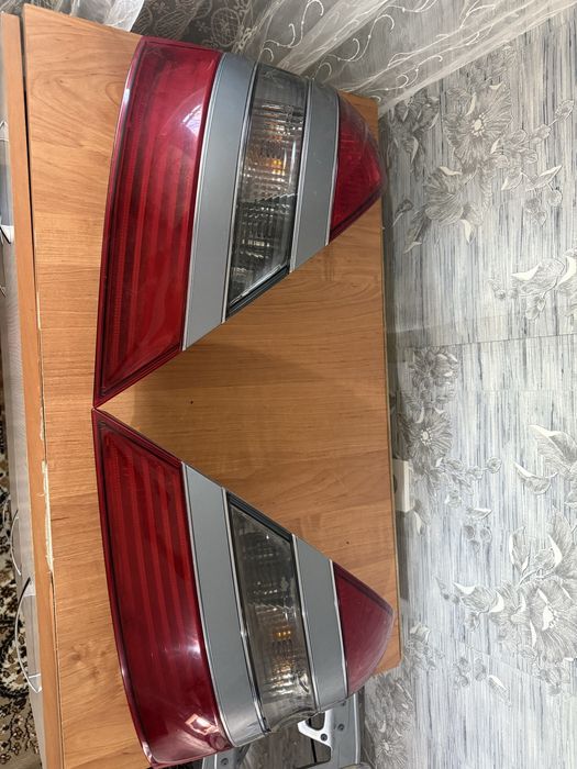 Продам задние фонари наw221