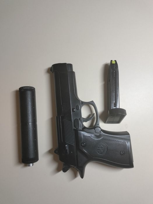 Игрушечный пистолет