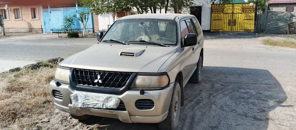 Мицубисси паджеро спорт