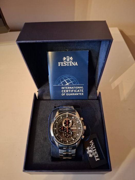 Ceas Festina aproape nou.