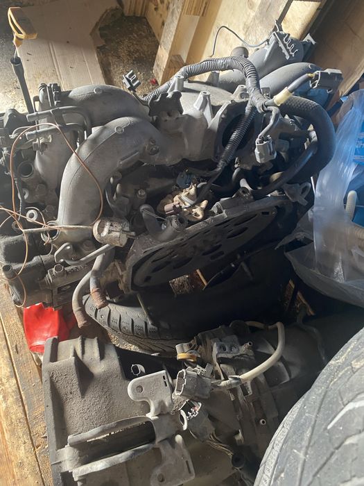 Продам каробку и двигатель На Субару