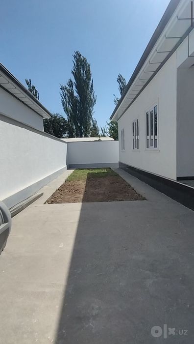 Кибрай тумани Майский 2,5 сотик 4 хона таёр ховли