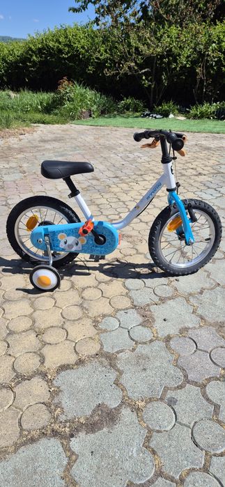 Vand bicicleta BTWIN  pt. copii cu roti ajutatoare