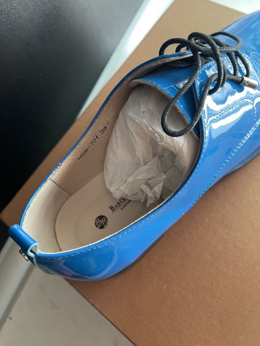 Обувь на низком каблуке