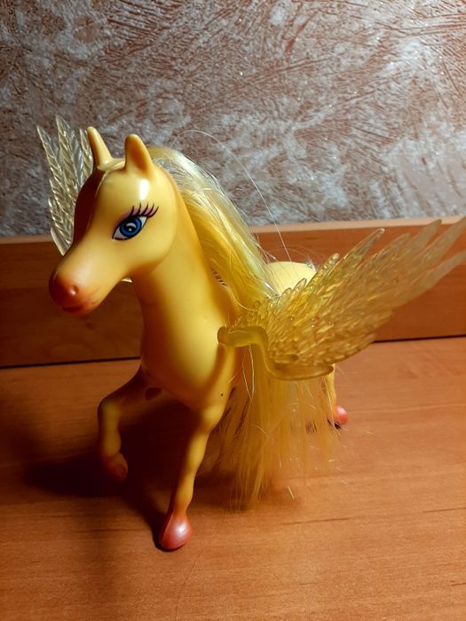 Детская игрушка лошадка