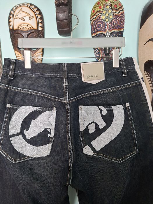 Set Scurtă impermeabilă+Pantaloni ECKO Unltd./300 Lei