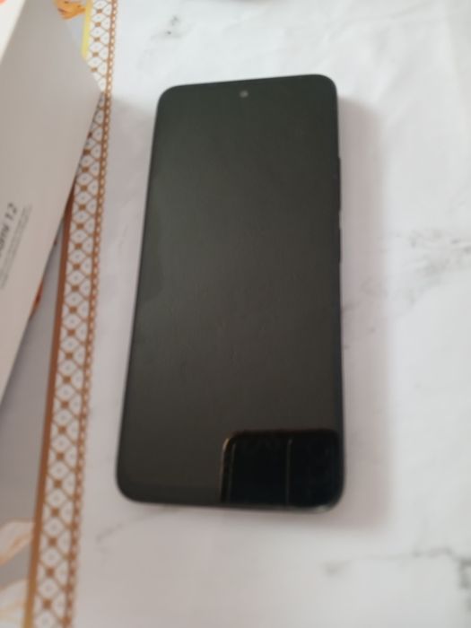 Продам редми 12 телефон