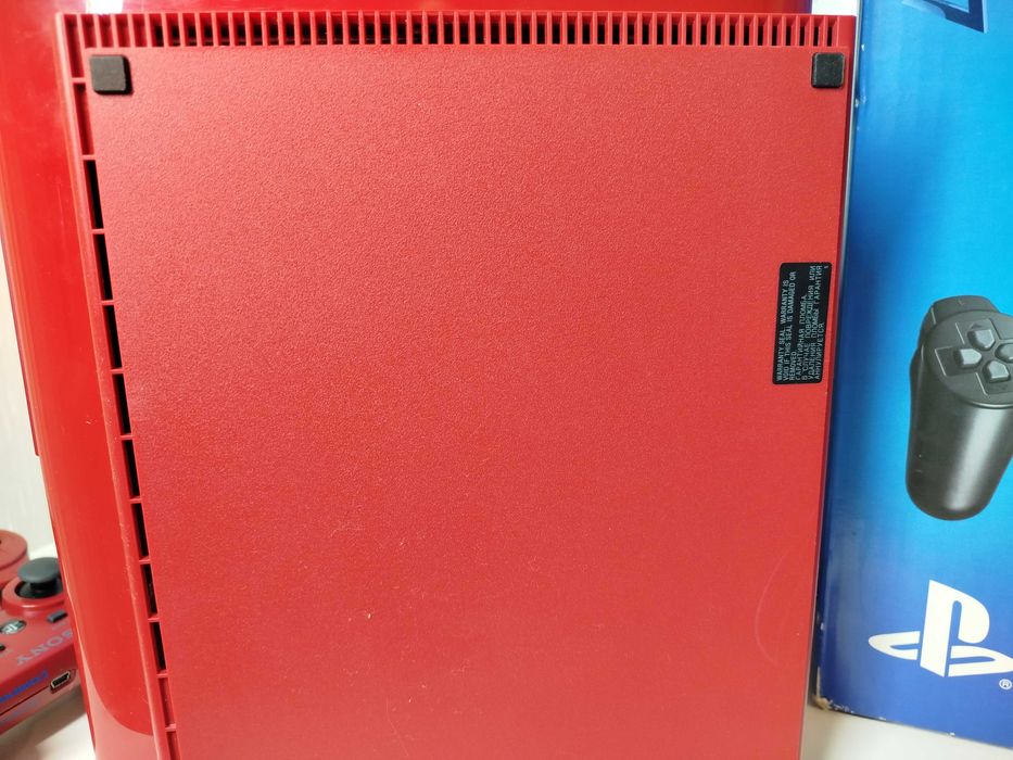 Sony Playstation 3 в коробке с документами