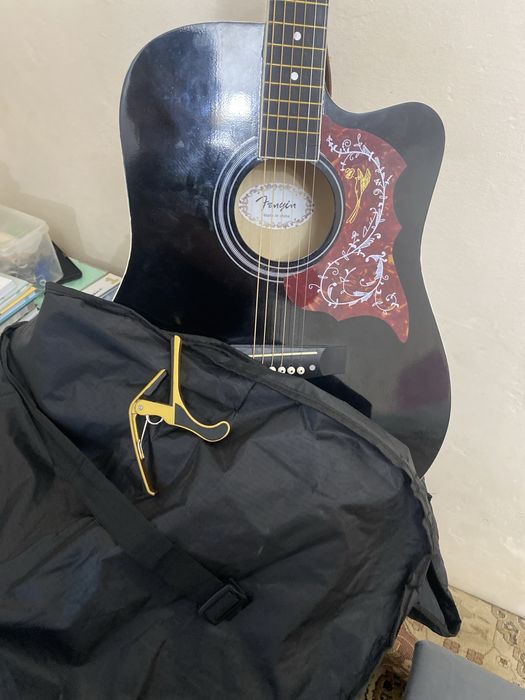 Гитара почти новый