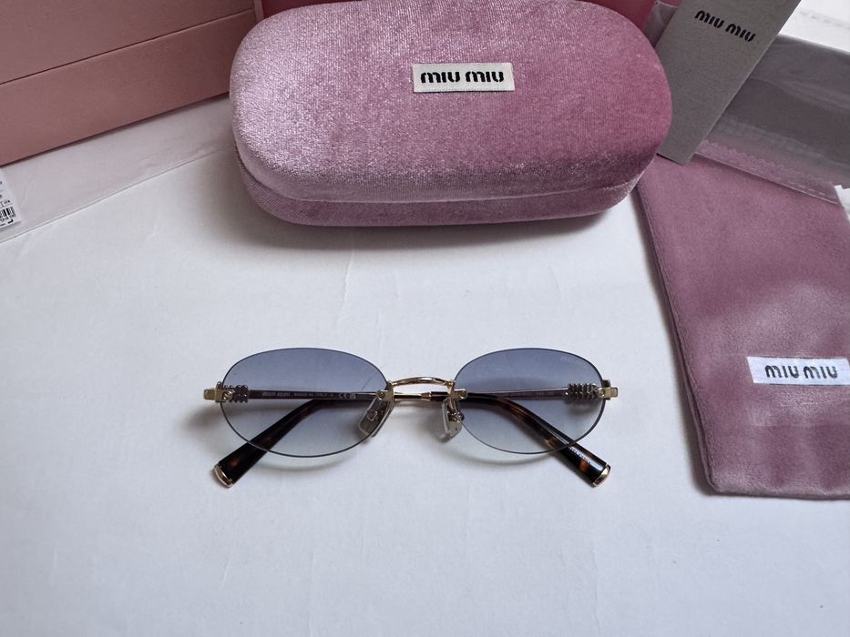 Ochelari de soare Miu Miu Oval-Rimless SMUA54 51-20 140, Noi