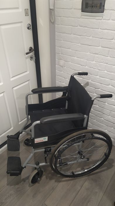 Инвалидная коляска