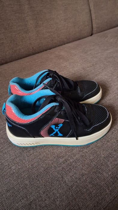 Продам роликовые кроссовки