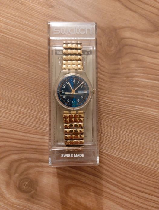 Ceas Swatch modelul Golden Days 1990 (Nou, sigilat la cutie)