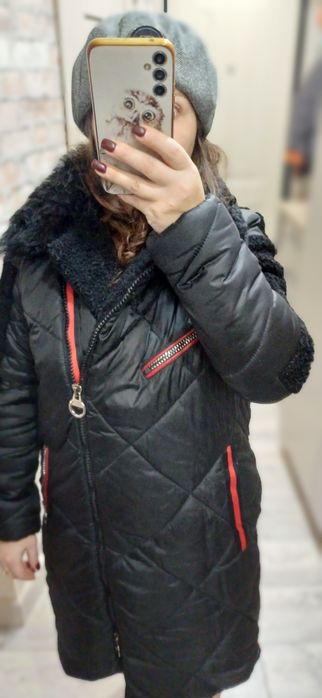 Продам женский пуховик