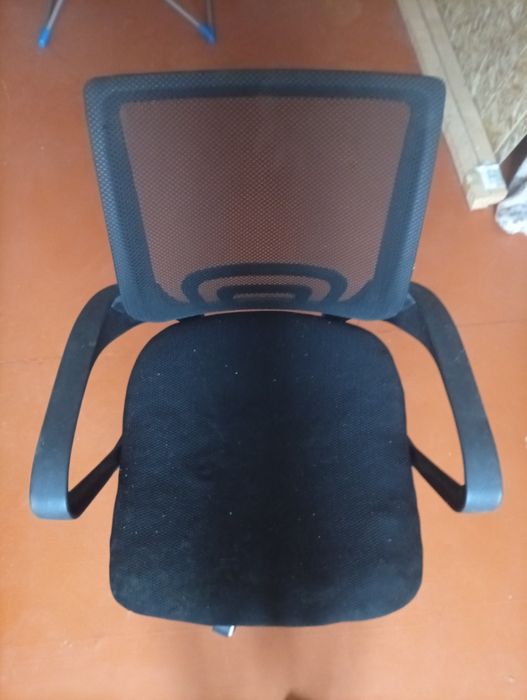 Офисное кресло .