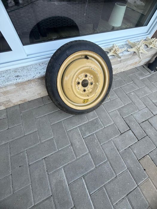 Vând roata de rezervă mazda 2