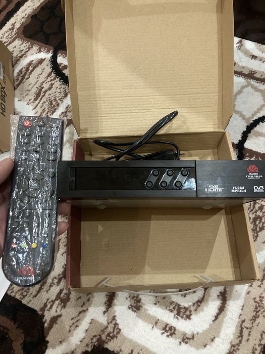 Продается тюнер новый почти не пользовались