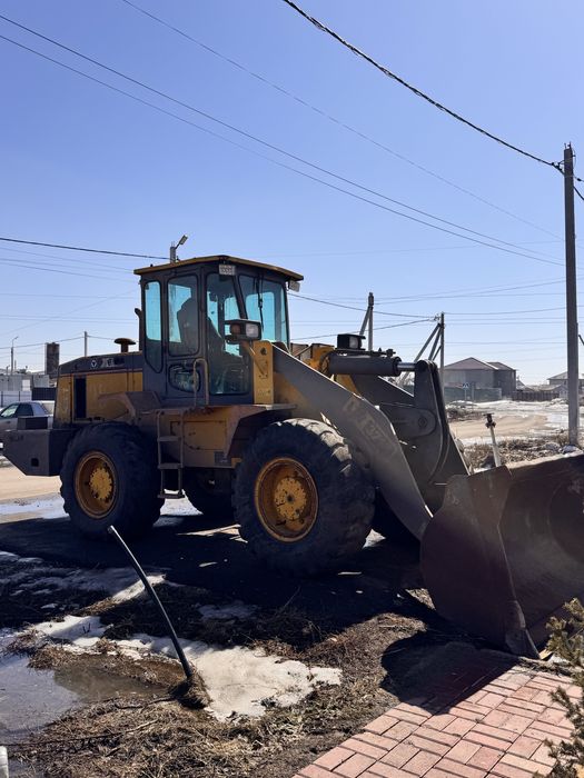 Продам фронтальный погрузчик