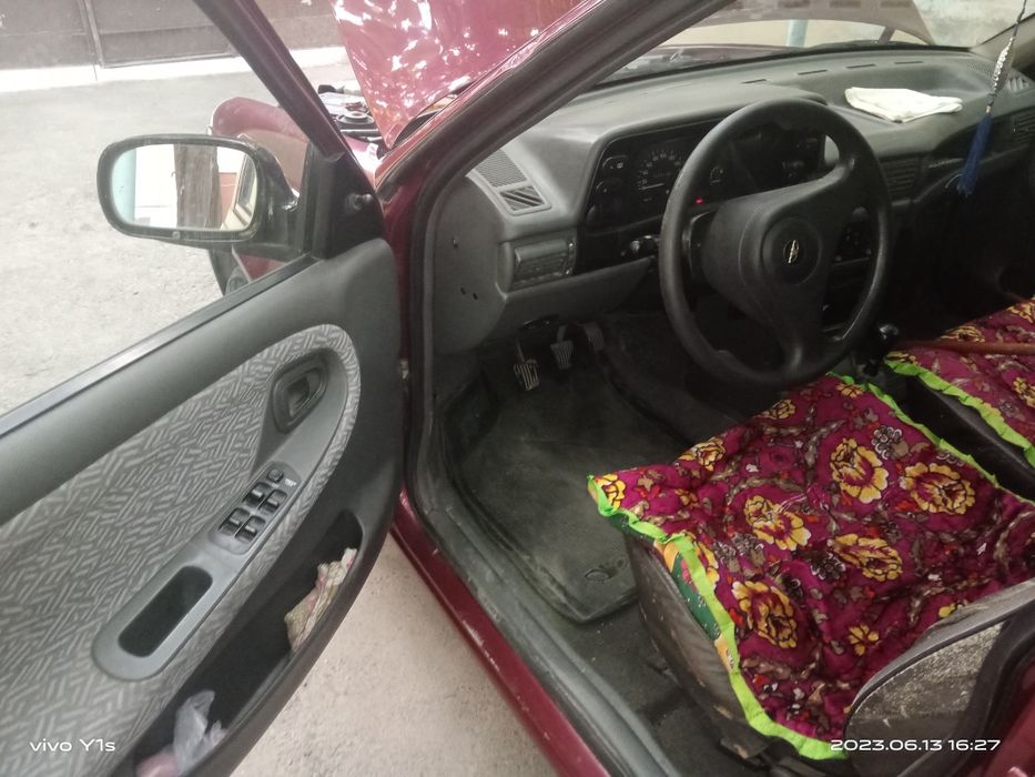 Автомобиль NEXIA1 DAEWOO