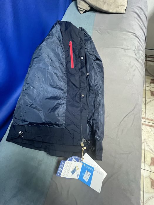 Продам ветровку новую