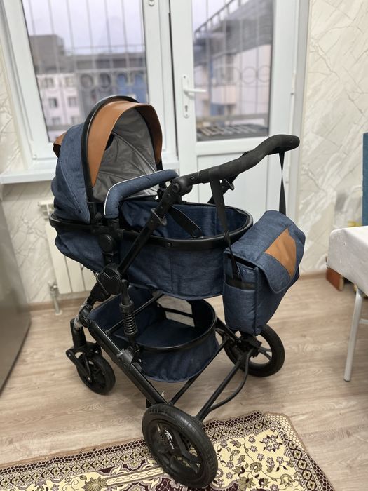 Коляска почти новая Teknum
