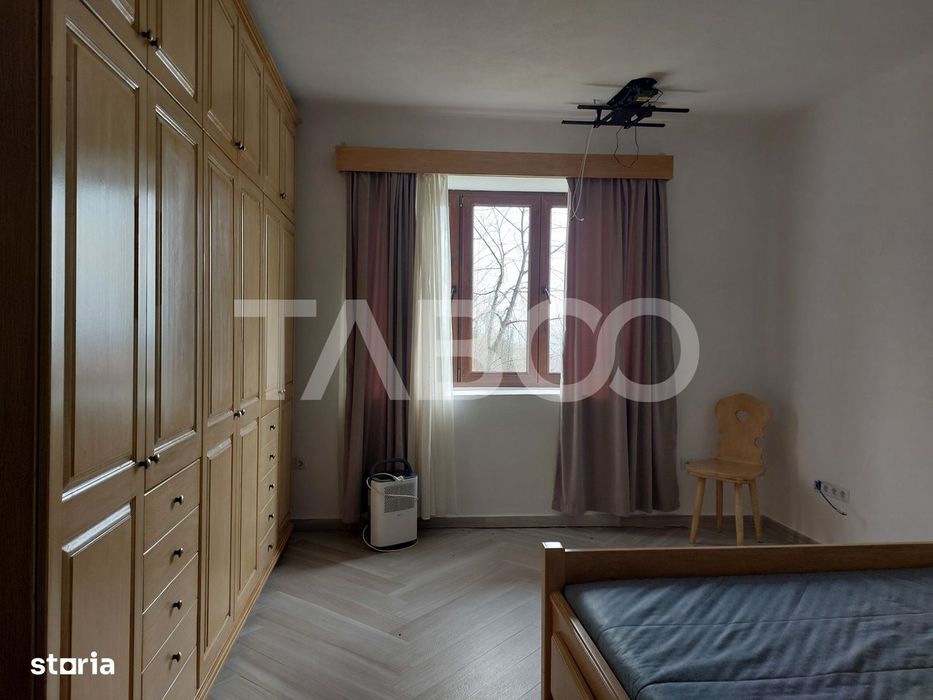 Casa 58 mp cu gradina 300 mp pet friendly central Cisnadioara