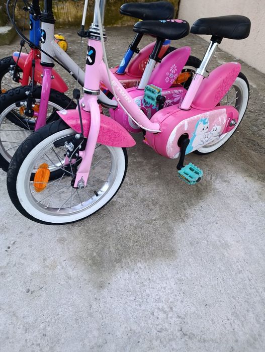 Vând bicicletă copii cu roți pe 14.