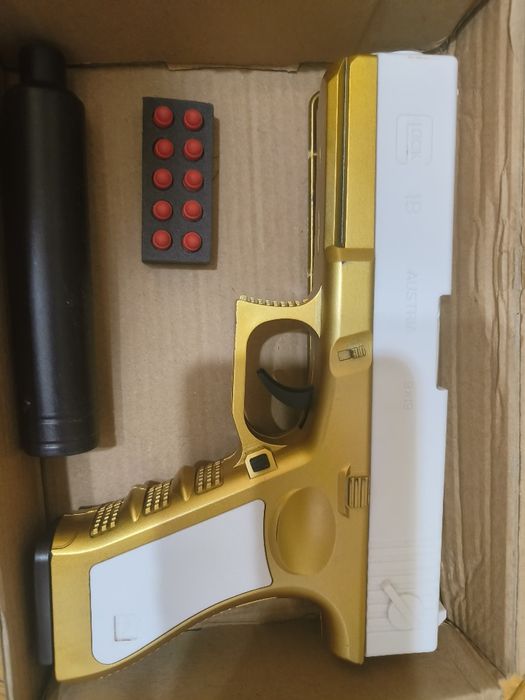 Детски пистолет с гумени патрони