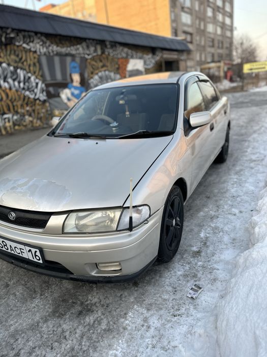 Продам машину mazda familia