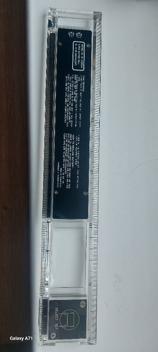 Riglă veche, cu ceas şi calcularor