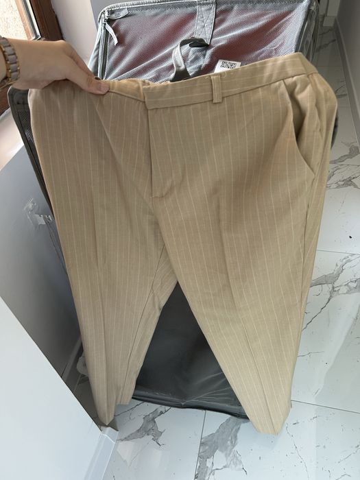 Pantaloni cu dunga Stradivarius