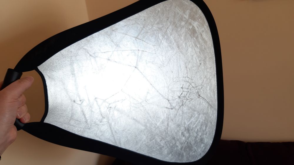 Едноръков рефлектор за фотоапарат