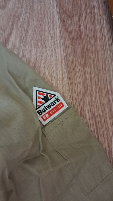 Продам новый фирменный комбинезон!