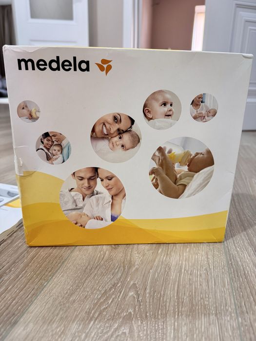 Электрический молокоотсос MEDELA