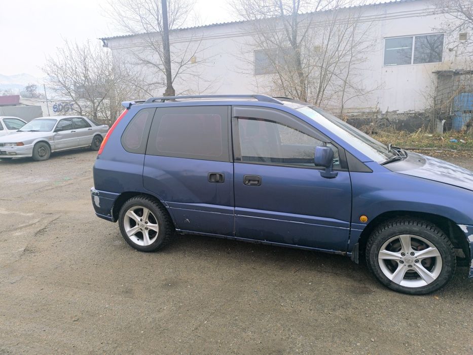 Митсубиси Спейс Руннер