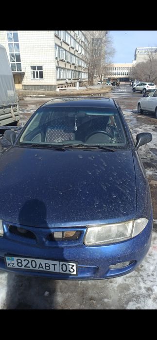 Mitsubishi carisma 1.8 mpi продаю до мая.