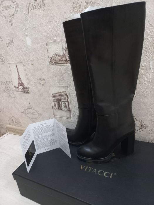 Продам новые кожаные сапоги